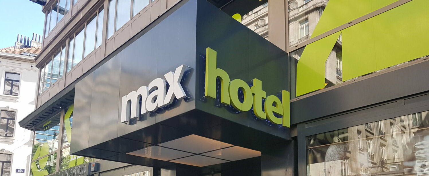 Facade of the Maxhotel in Brussel with its green and black logo
